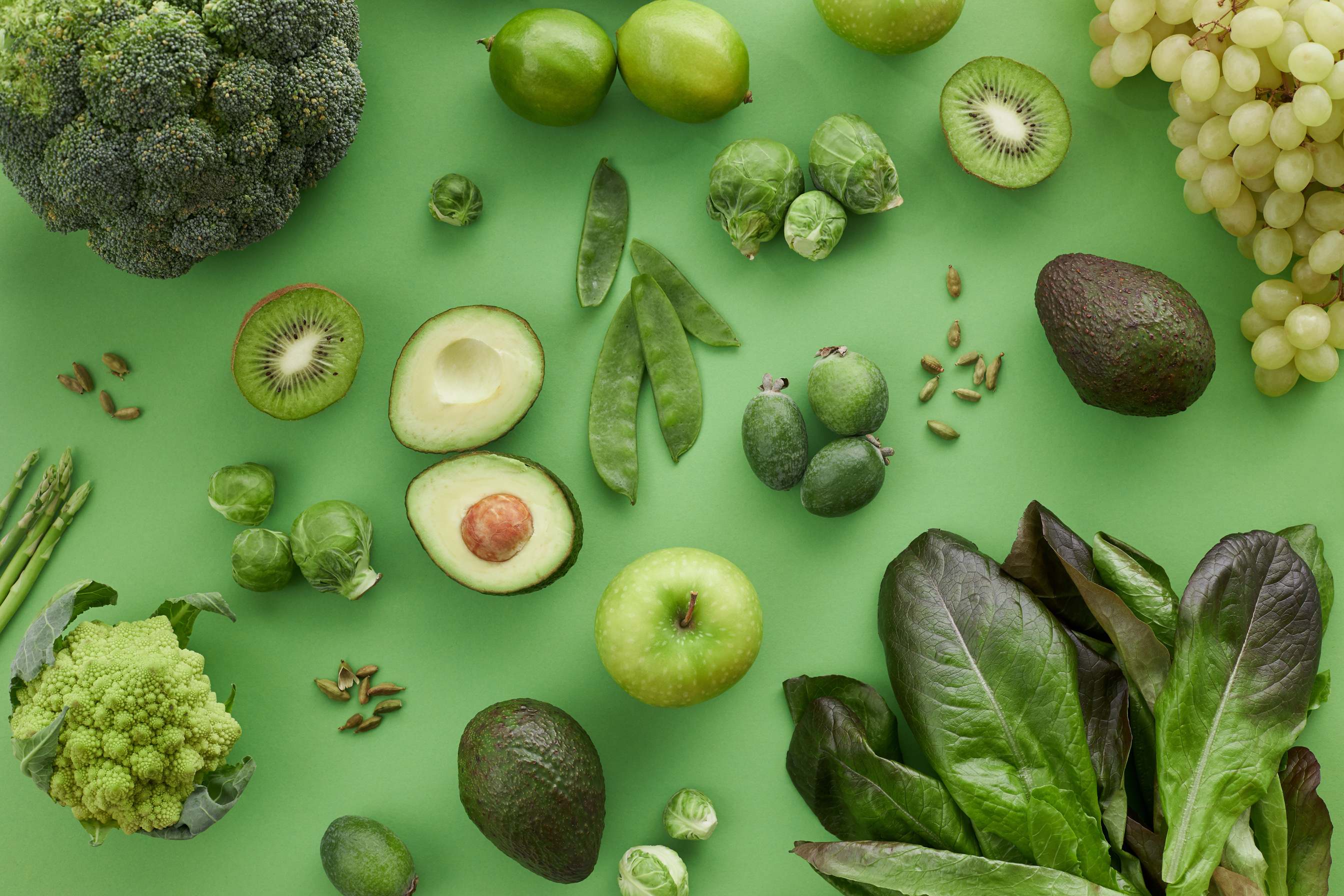 Assorted Vegetables and Fruits on Green Surface
